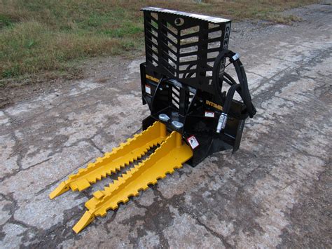 tree post puller bobcat skid steer quick attachment|skid steer post puller.